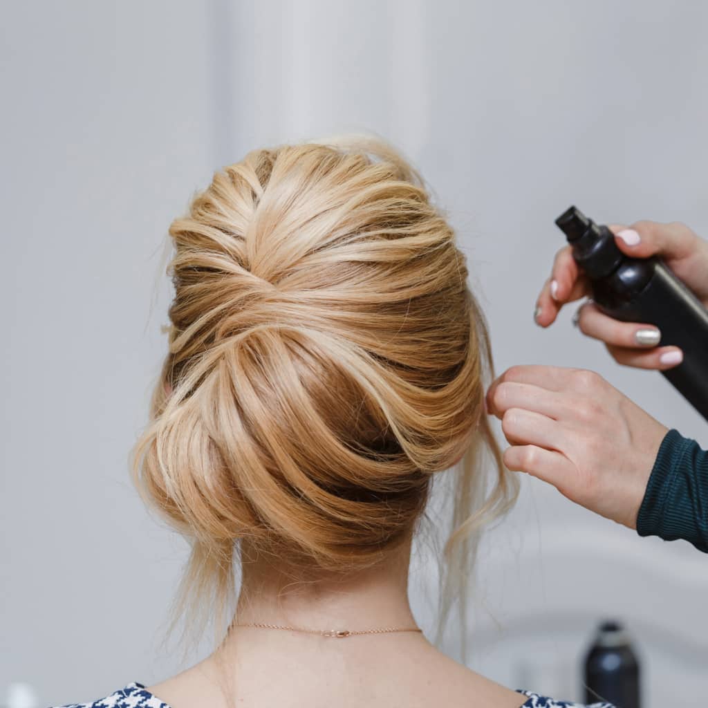 soft wedding hairstyle updo blonde hair highlights with some soft curls down