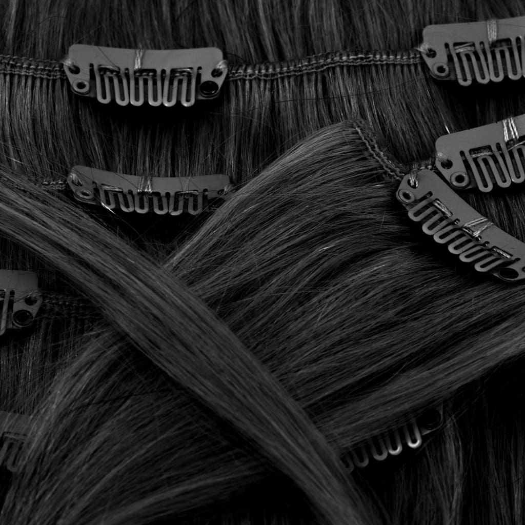 Close-up view of multiple dark brown clip-in hair extensions, showing the clips attached to the wefts, arranged in layers. The clips are black with a secure grip design, ideal for easy and safe attachment to natural hair.