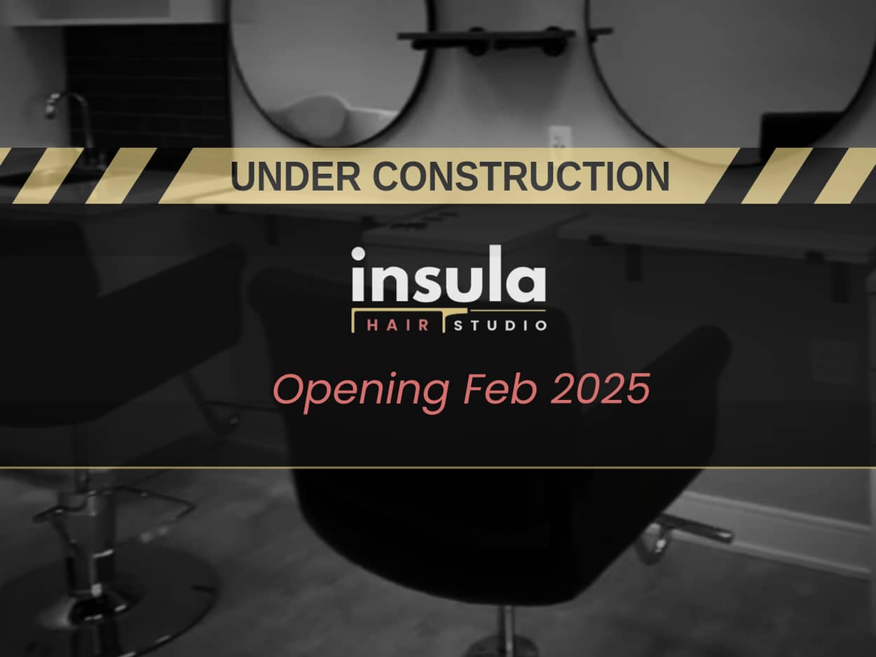 A graphic announcing the opening of Insula Hair Studio in February 2025. The design features a black-and-white background of a salon interior with sleek chairs and mirrors, overlaid with a bold "Under Construction" banner and the studio's logo. Perfectly suited for Mississauga and Milton clientele looking for premium hair services.